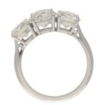 Three-stone diamond engagement ring in platinum