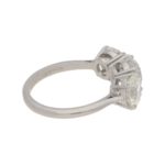 Three-stone diamond engagement ring in platinum