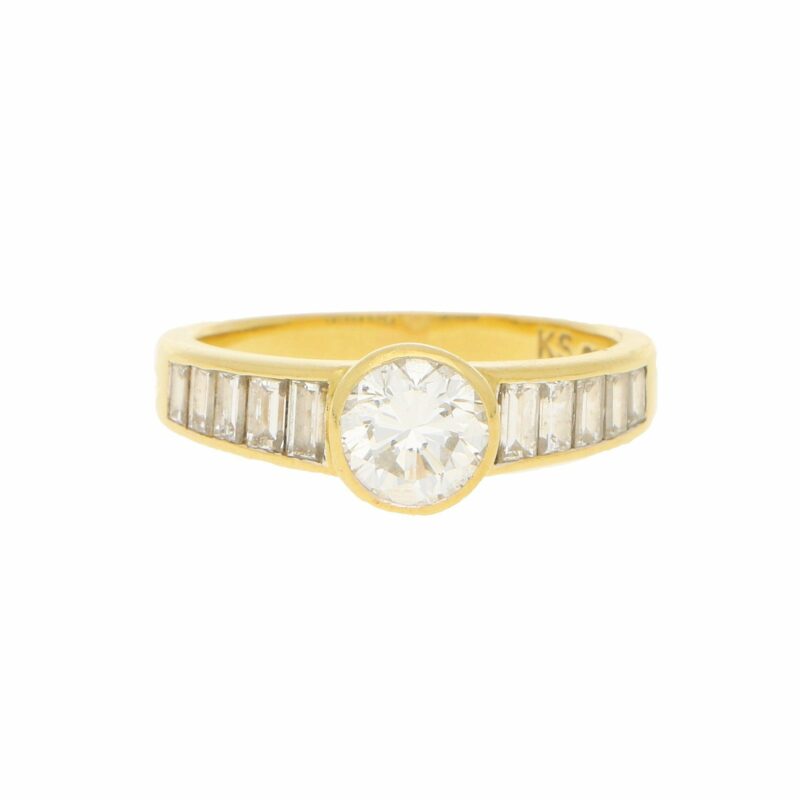 Elegant diamond ring with baguette diamond shoulders