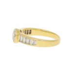 Elegant diamond ring with baguette diamond shoulders