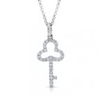 An 18ct white gold diamond set key pendant on a chain