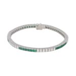 Platinum diamond and emerald line bracelet