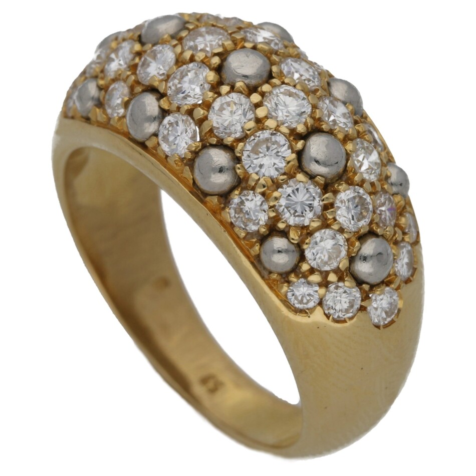 Cartier: Diamond set gold bombé ring