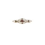 Victorian garnet and seed pearl shield brooch