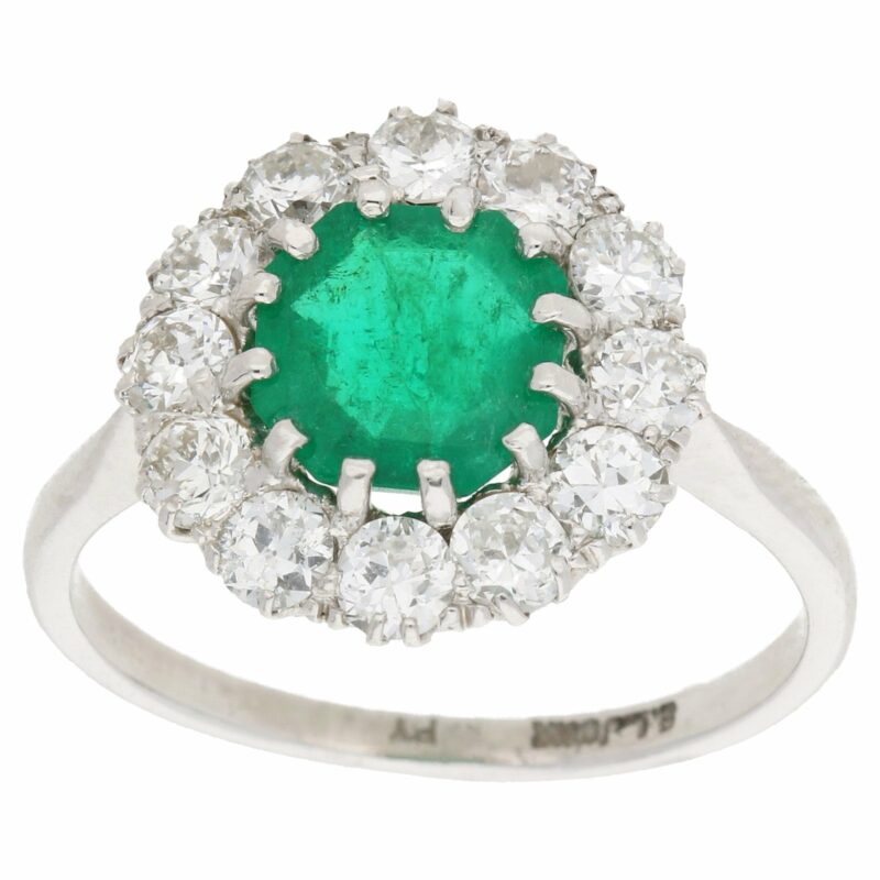 Platinum emerald diamond cluster engagement ring