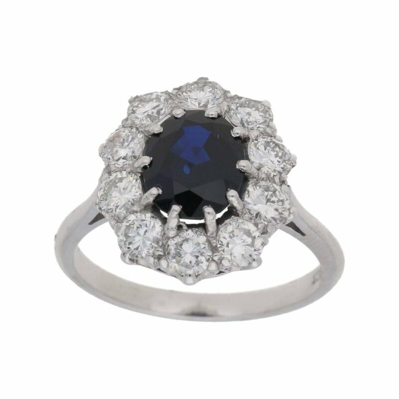 18ct white gold oval sapphire and diamond cluster ring