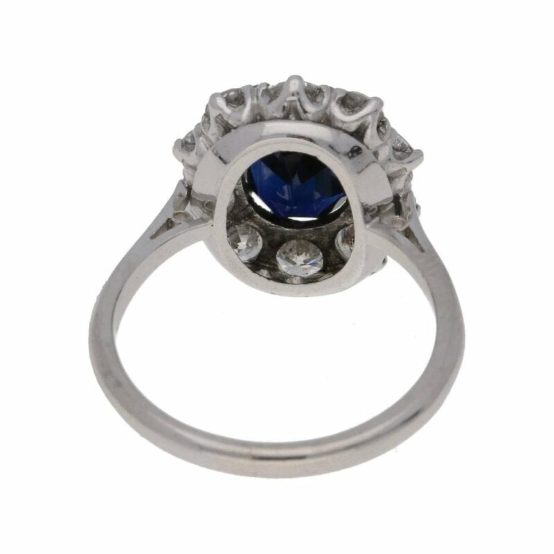 18ct white gold oval sapphire and diamond cluster ring