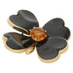 1950's gold pierced openwork onyx flower brooch