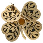 1950's gold pierced openwork onyx flower brooch