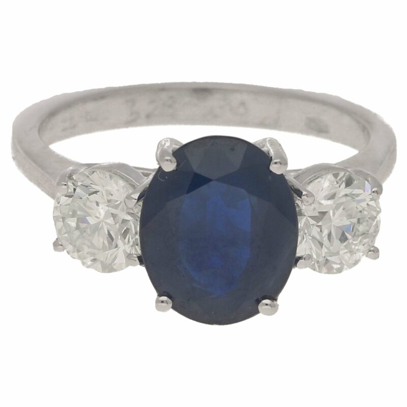 Three-stone sapphire and diamond ring