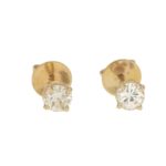 Diamond stud earrings in yellow gold