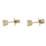 Diamond stud earrings in yellow gold