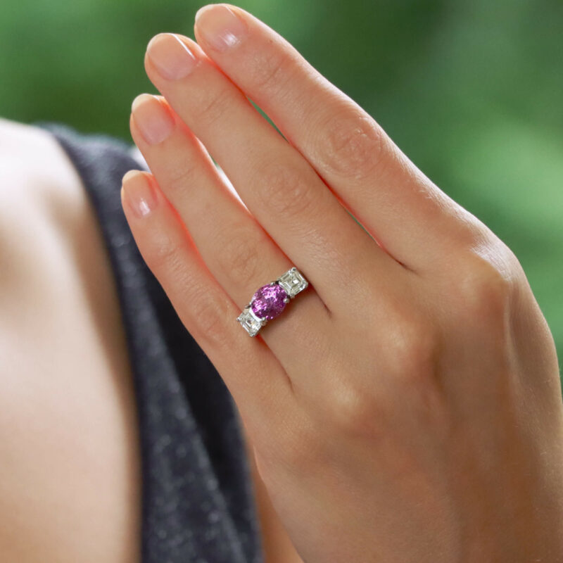 Pink sapphire and diamond three stone ring