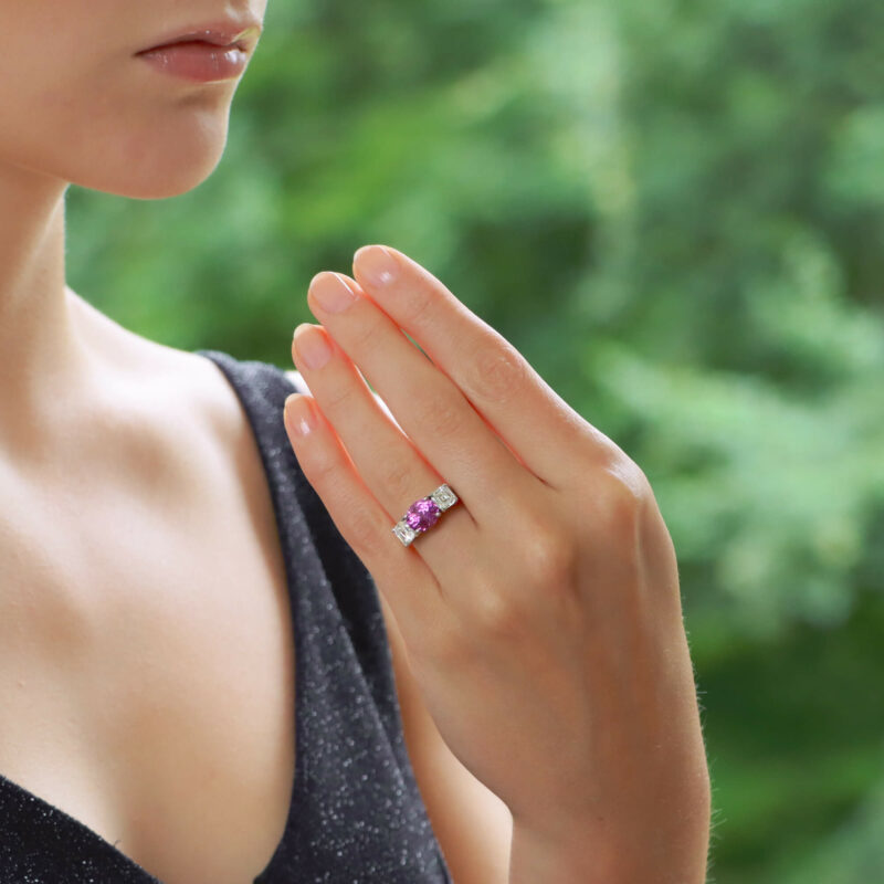 Pink sapphire and diamond three stone ring