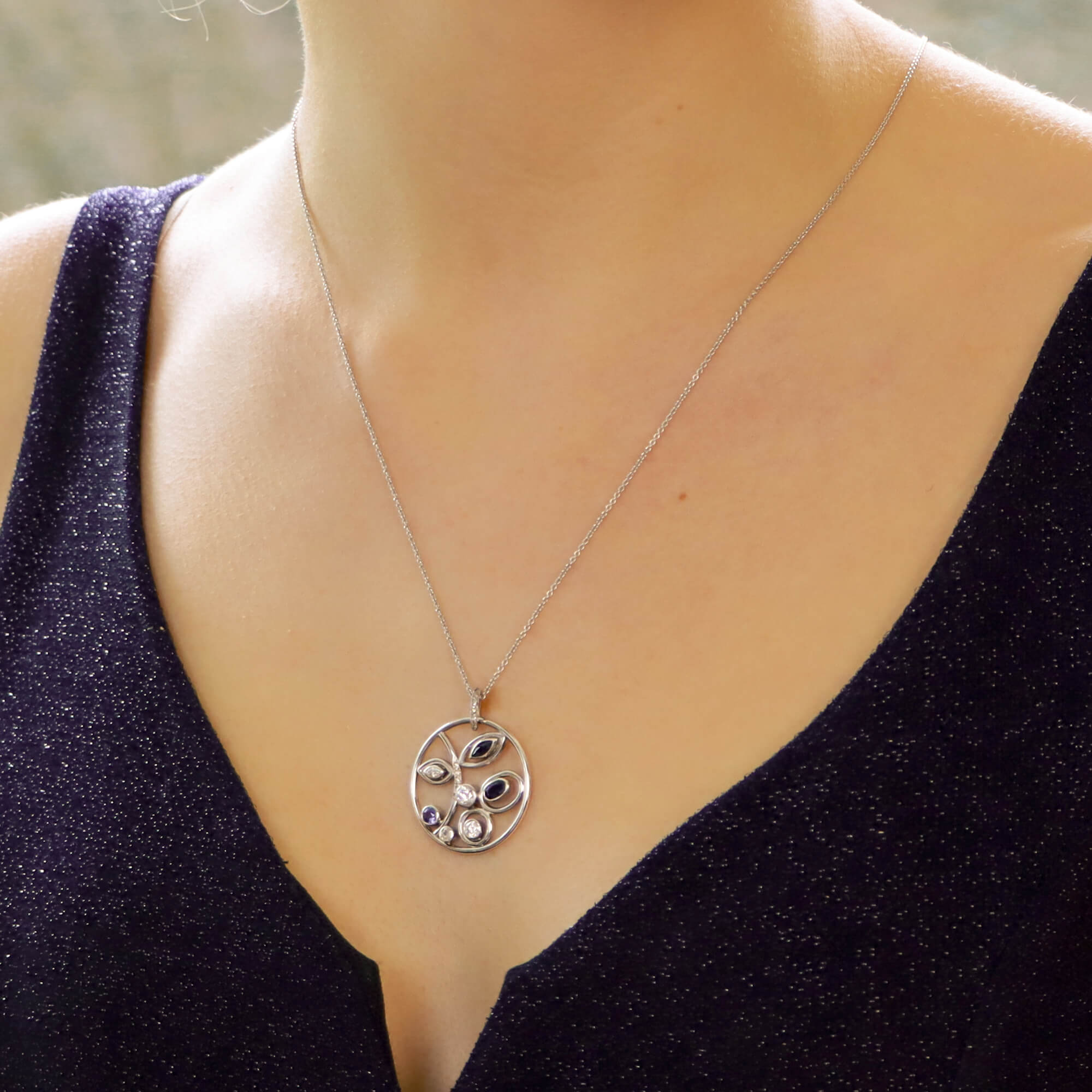Modern Sapphire and Diamond Circular Foliate Pendant White Gold at
