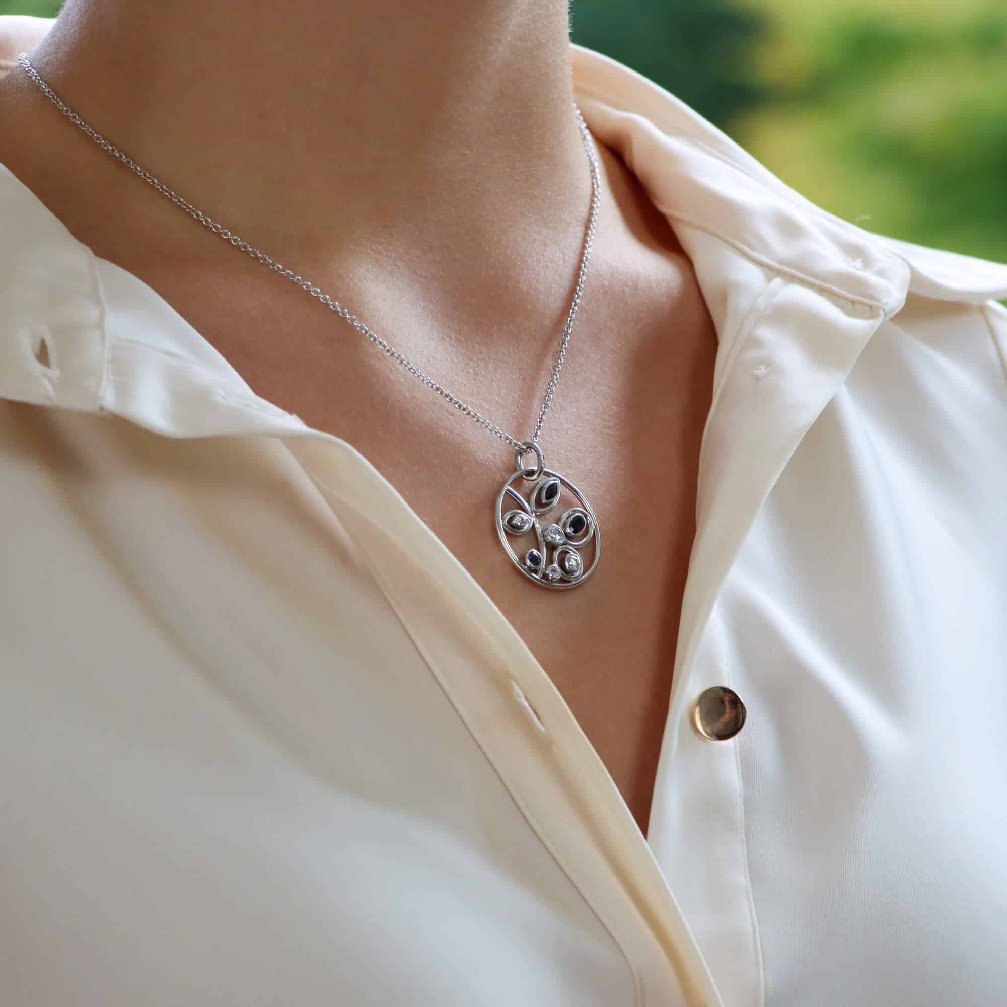 Modern Sapphire and Diamond Circular Foliate Pendant White Gold