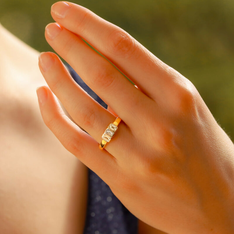 1990s Emerald-Cut Diamond Three Stone Ring in Yellow White Gold