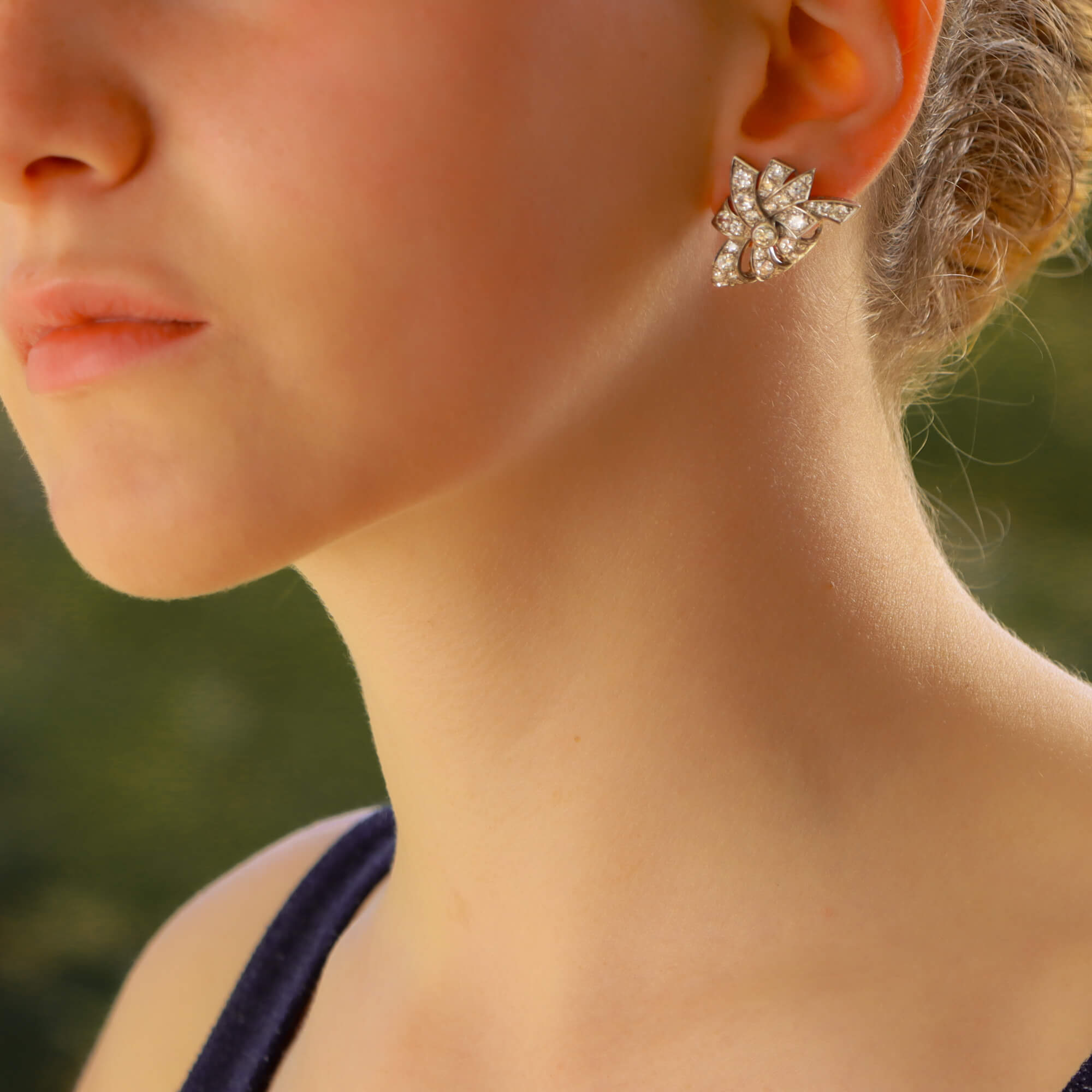 White gold shop bow earrings