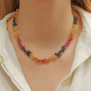 A graduated single strand briolette cut multi-gem necklace