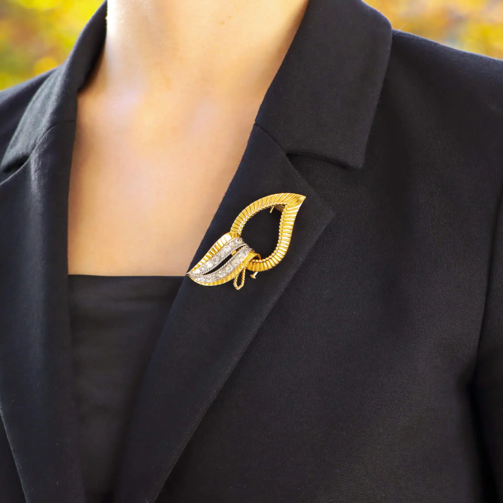 Mellerio foldable diamond leaf brooch in yellow gold, French