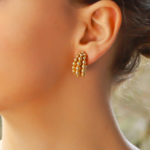 Boucheron "Grains de Raisin" clip earrings in yellow gold