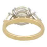 Contemporary Round Brilliant Cut Diamond and Shield Cut Ring