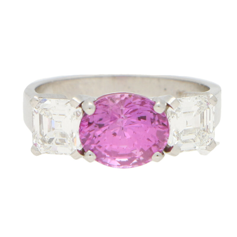 Pink sapphire and diamond three stone ring