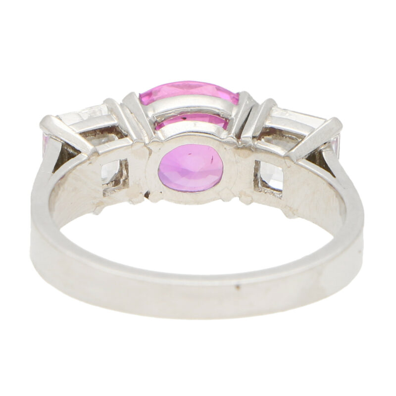 Pink sapphire and diamond three stone ring