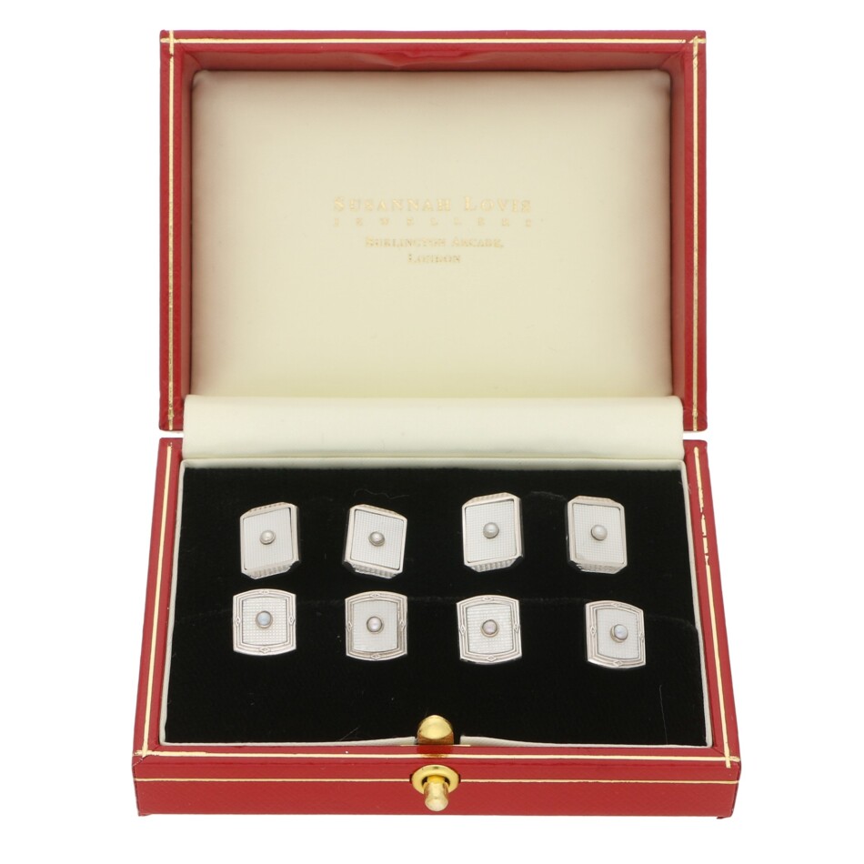 A set of mother-of-pearl cufflinks and dress studs