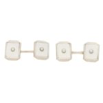 A set of mother-of-pearl cufflinks and dress studs