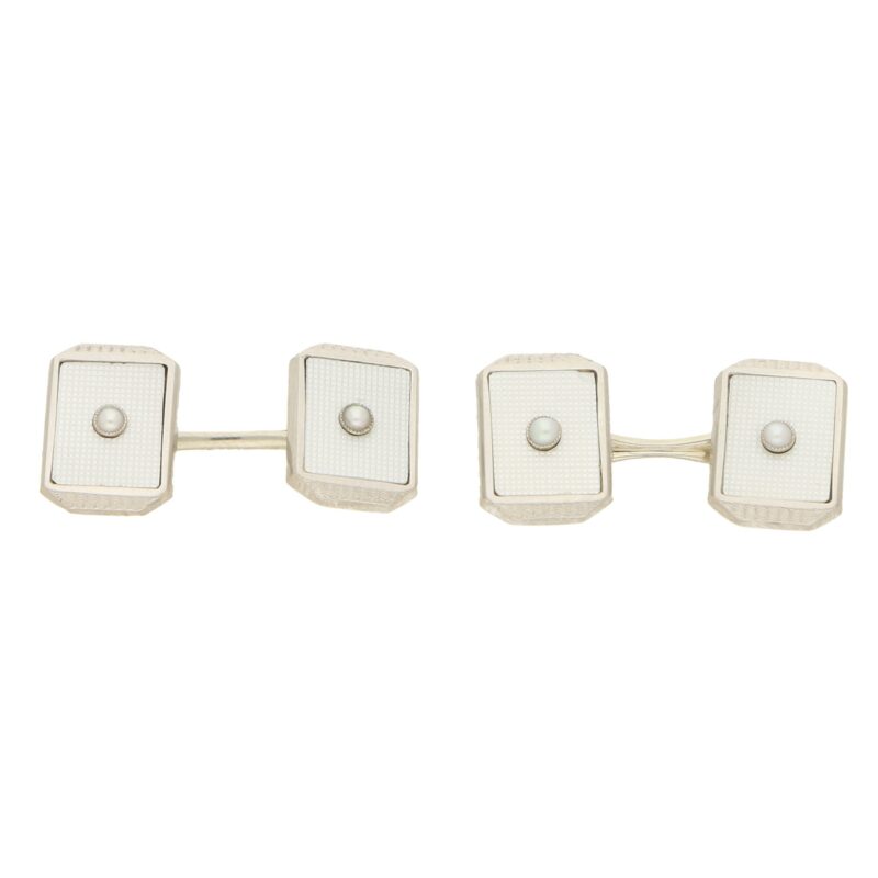 A set of mother-of-pearl cufflinks and dress studs