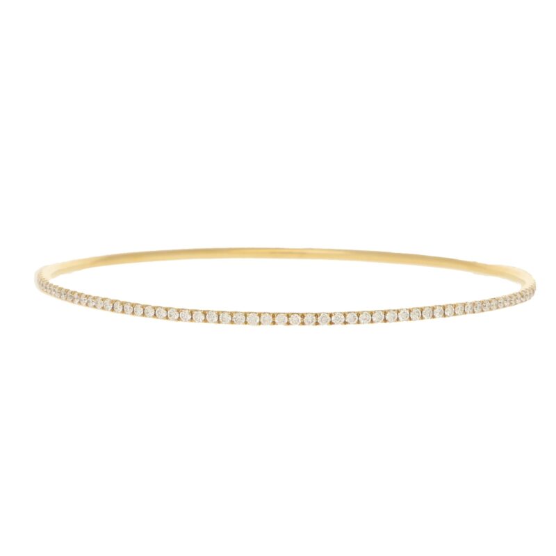 Diamond bangle in 18K yellow gold.