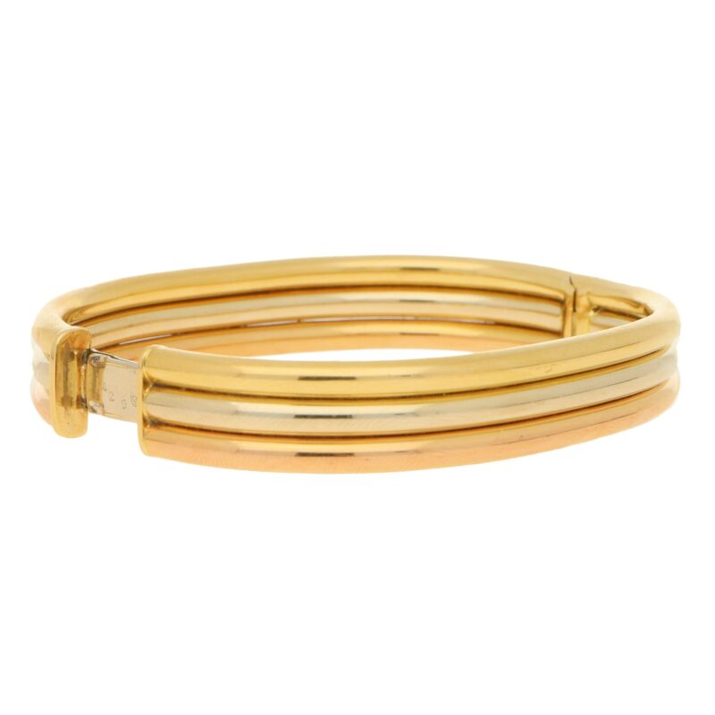 Vintage Cartier Trinity bracelet in 18k tri-colour gold.