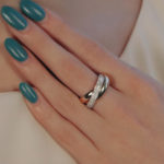 Trinity ring with full diamond set band in 18k tri-colour gold.