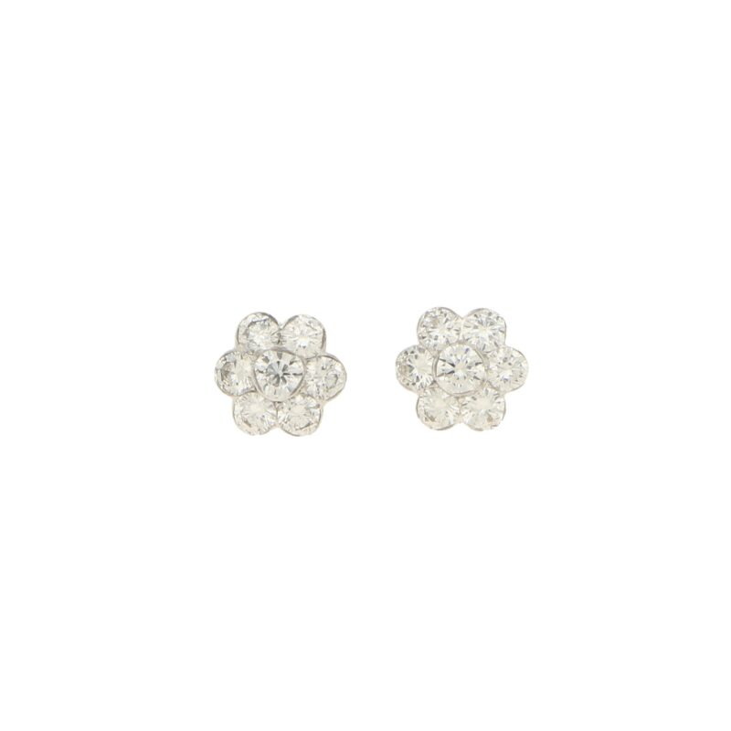 Floral diamond stud earrings in 18k white gold.