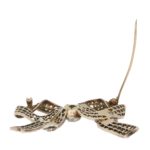 Victorian diamond bow brooch in silver and yellow gold.