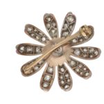 Victorian floral diamond brooch in silver and yellow gold.