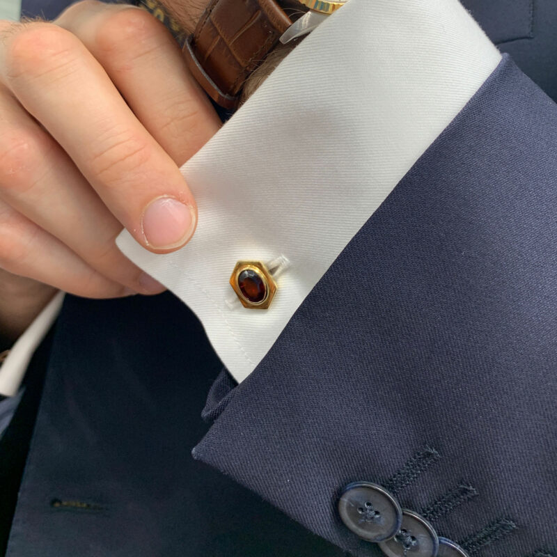 Vintage Cartier almandine garnet cufflinks in 18K yellow gold.