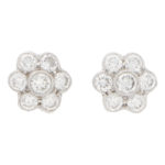 Floral diamond stud earrings in 18k white gold.