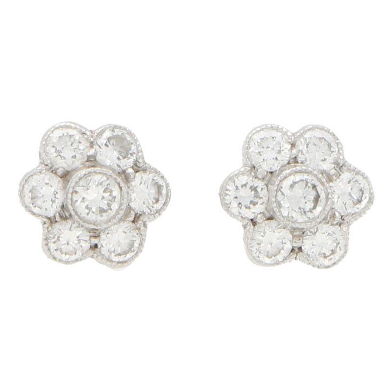 Floral diamond stud earrings in 18k white gold.