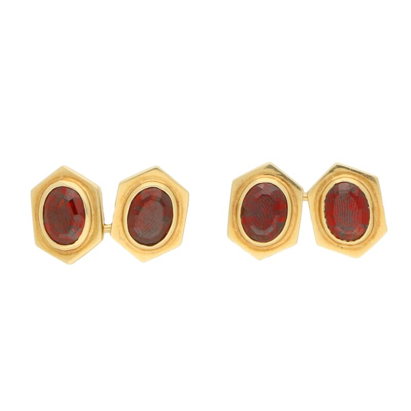 Vintage Cartier almandine garnet cufflinks in 18K yellow gold.