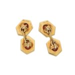 Vintage Cartier almandine garnet cufflinks in 18K yellow gold.