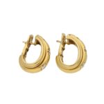 Piaget Possession diamond hoop earrings in 18k yellow gold.