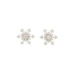 Diamond snowflake earrings in 18K white gold.