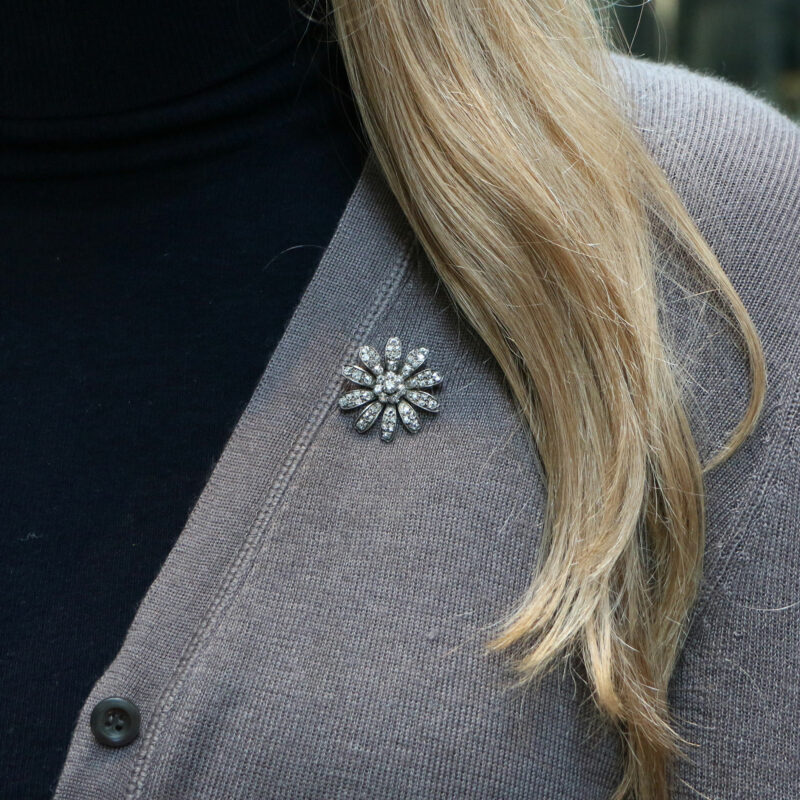 Victorian floral diamond brooch in silver and yellow gold.