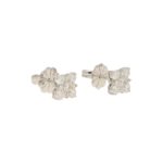 Diamond blossom stud earring in 18K white gold.