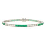 Platinum diamond and emerald line bracelet