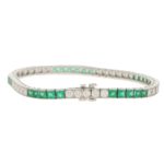 Platinum diamond and emerald line bracelet