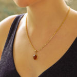 Round Red Garnet Pendant Set in 9k Yellow Gold