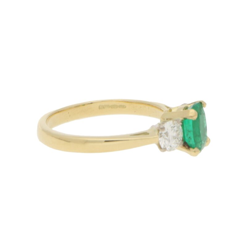 Emerald and Diamond Trilogy Engagement Ring in Yellow Gold